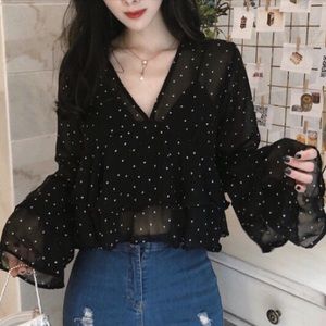 Transparent black polkadot blouse runs a bit small